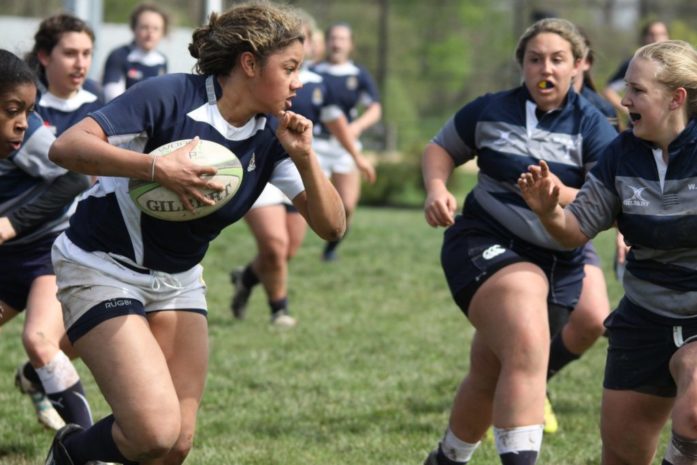 Girls playing rugby