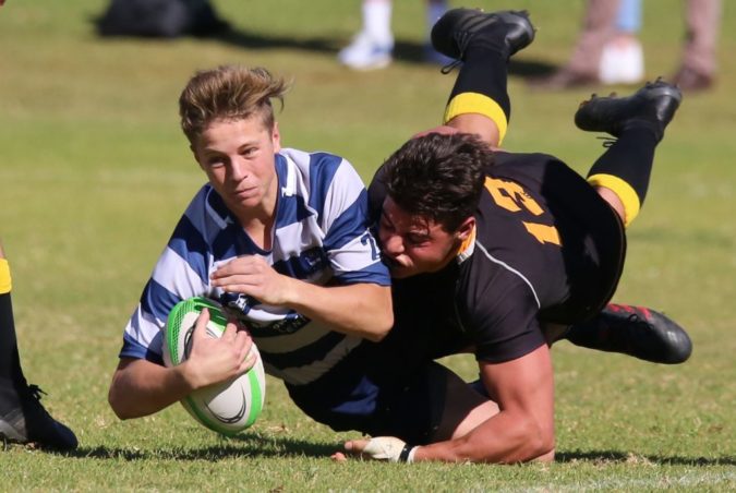 Boys playing rugby